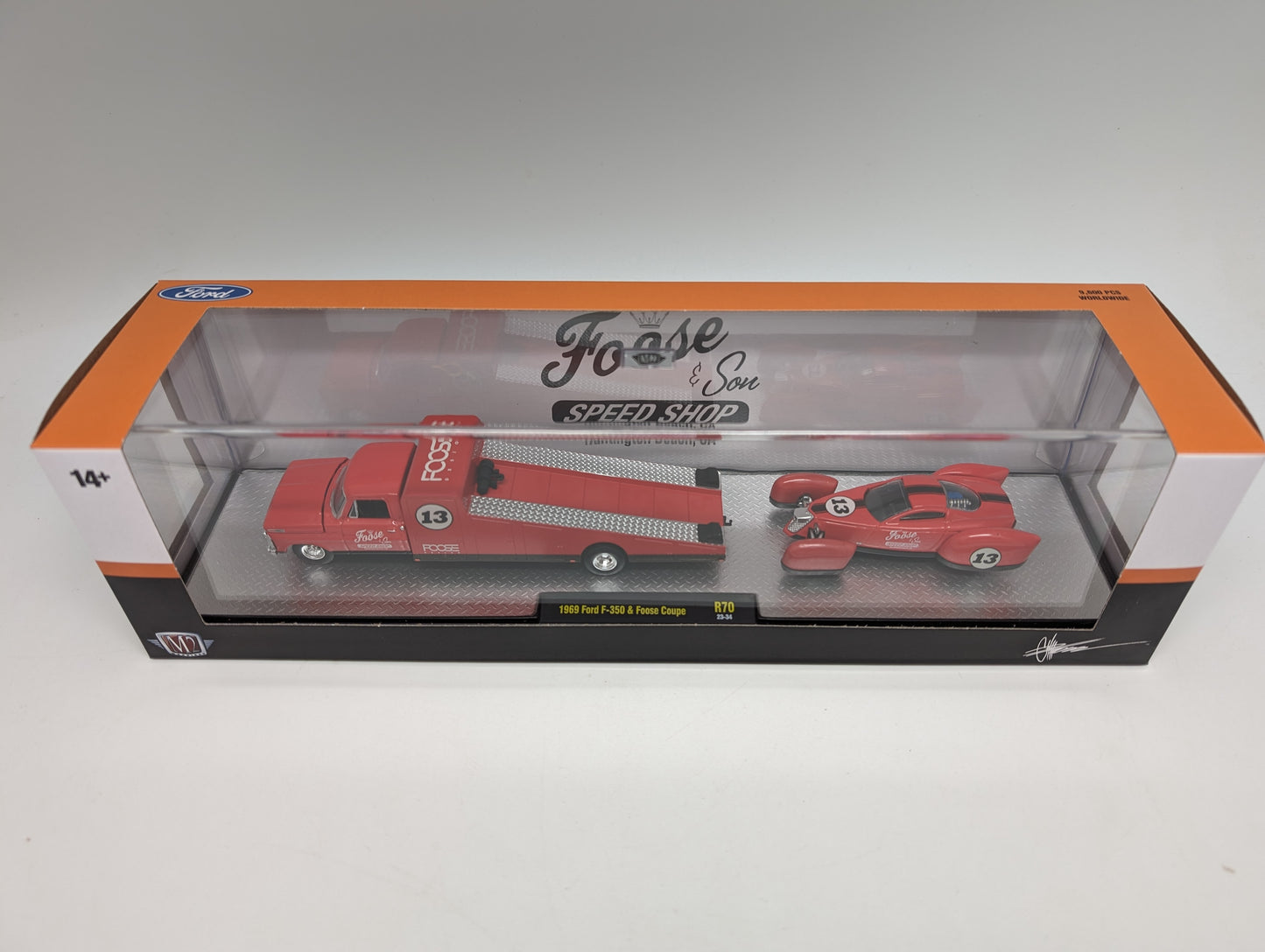 M2 1969 Ford F350 race car hauler with a matching Foose Coupe
