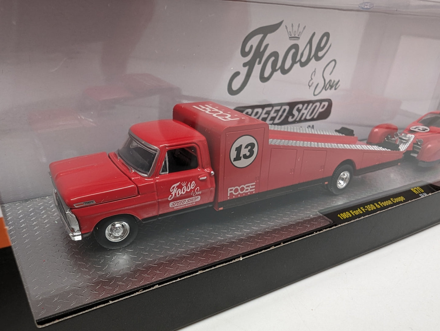 M2 1969 Ford F350 race car hauler with a matching Foose Coupe