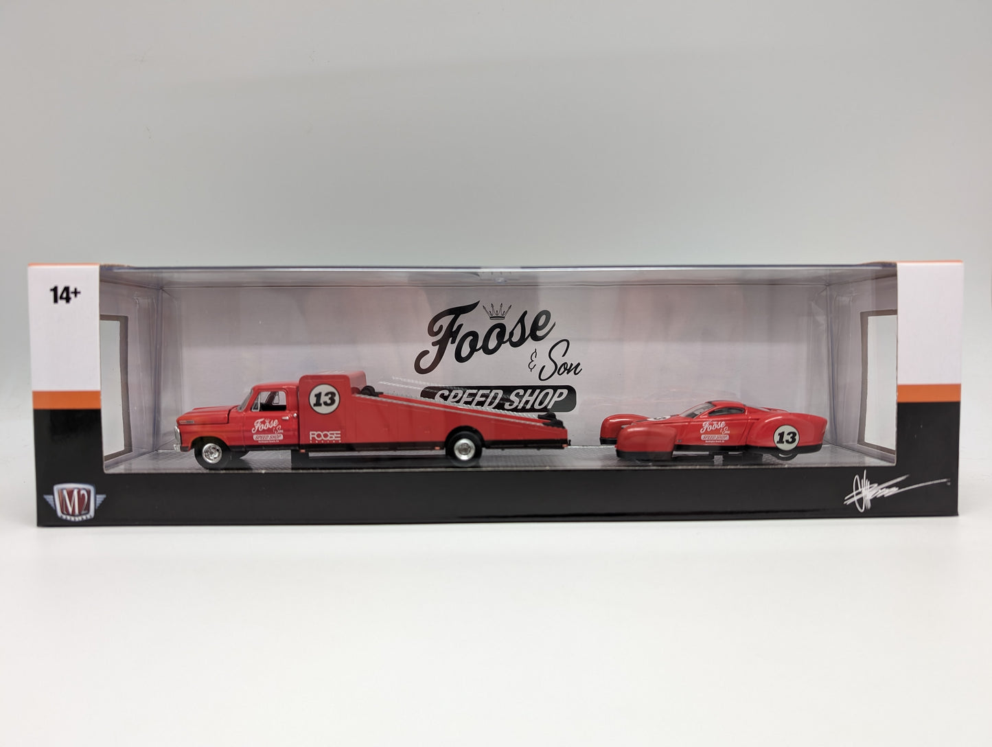 M2 1969 Ford F350 race car hauler with a matching Foose Coupe